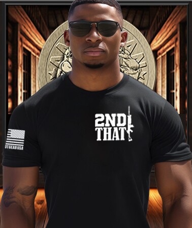 American Patriot Man wearing a Patriot Gear USA Apparel Company black t-shirt with '2nd That' text, sunglasses, and an American flag sleeve patch in front of a Patriot Gear Apparel Company logo on USA flag Background.