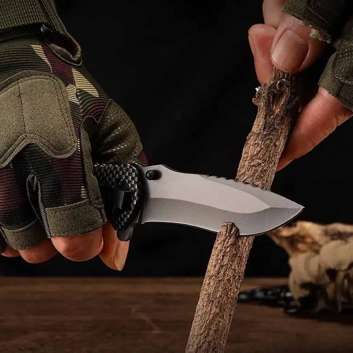 Beautifully crafted, high-hardness multi-purpose stainless steel camping or survival knife featuring a hardwood grip. American Outfitters