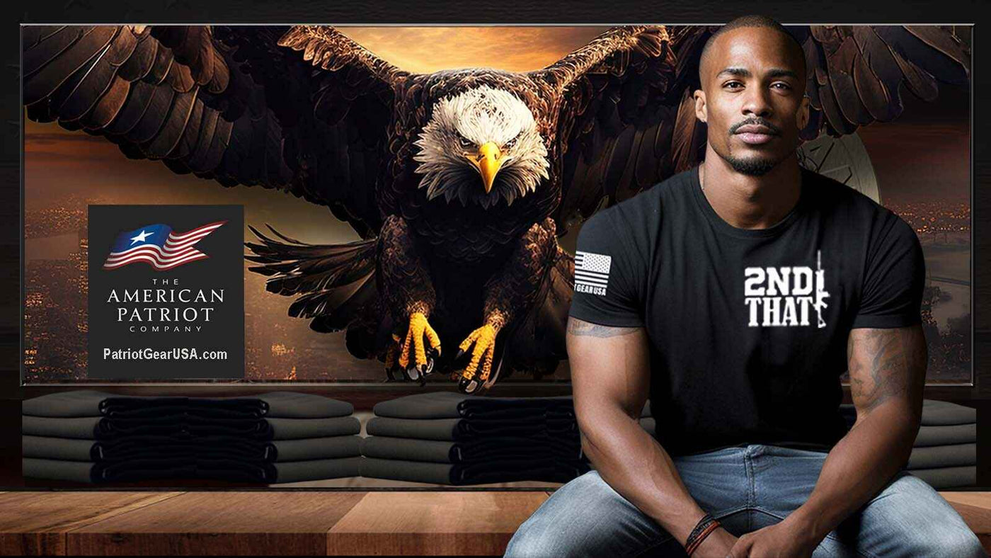 Black American  Patriot Man wearing a black t-shirt with '2nd Amendment' text in front of an American Patriot Apparel Company advertisement with an eagle.