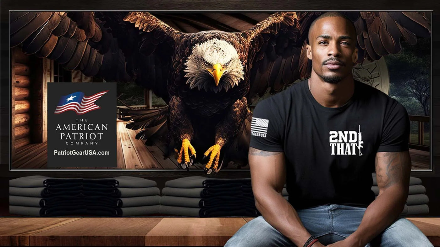 Black American  Patriot Man wearing a black t-shirt with '2nd Amendment' text in front of an American Patriot Apparel Company advertisement with an eagle.